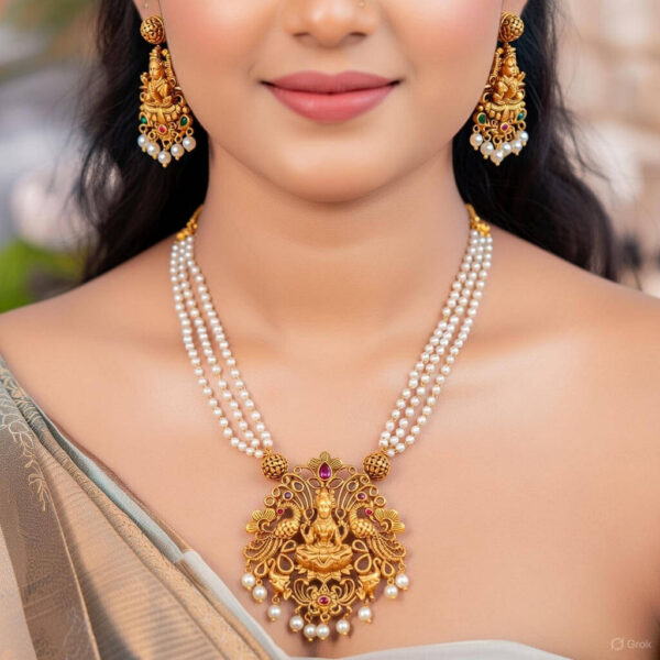 Yaarita’s Clustered Pearl Ruby Green Moti Temple Laxmi Long Pendant Set